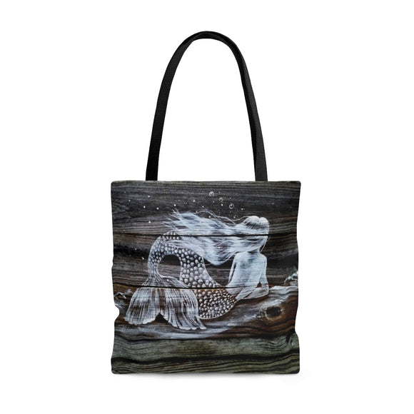 Reclining mermaid on dark wood painting on Tote Bag