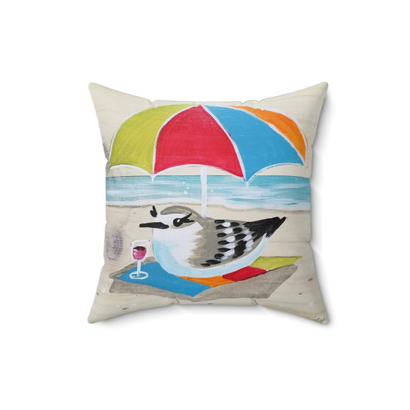 Sanderling under umbrella pillow