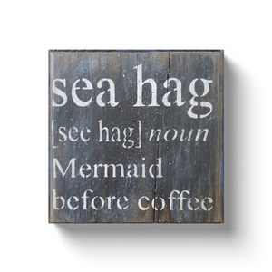 White sea hag mermaid before coffee with black background, rustic painting canvas print of painting on wood front view