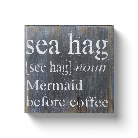 White sea hag mermaid before coffee with black background, rustic painting canvas print of painting on wood front view